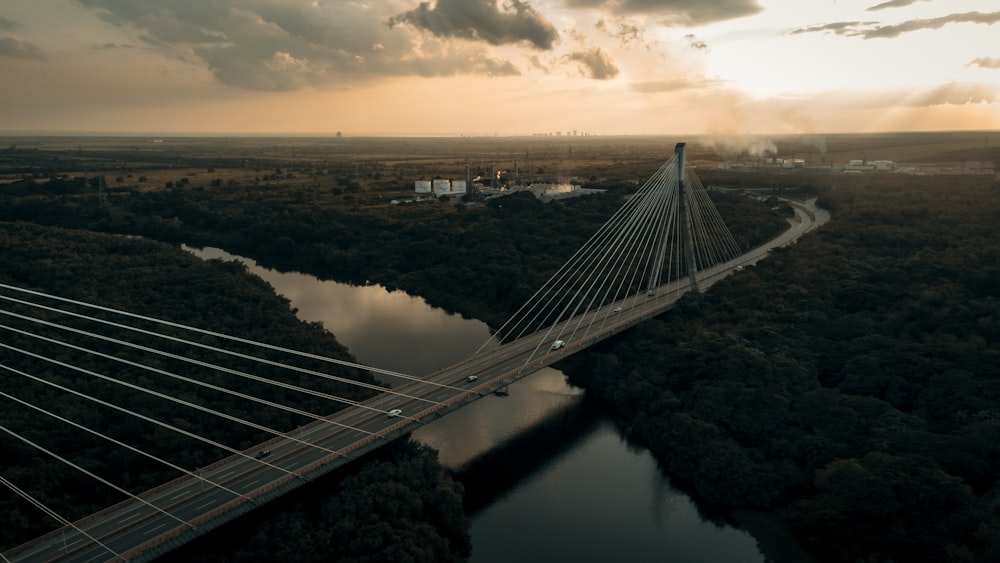 an aerial view of a bridge over a river