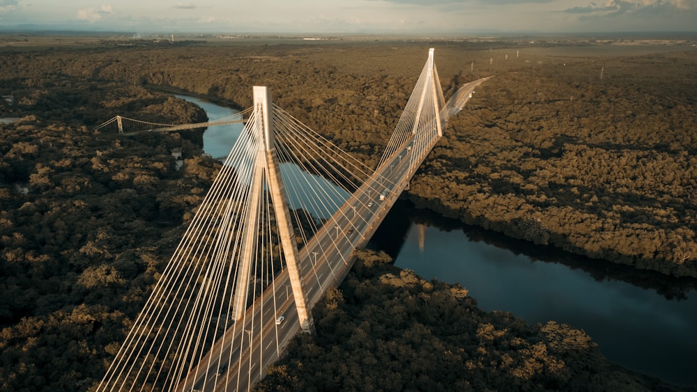 an aerial view of a bridge over a river