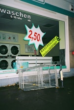 A price list displayed in a laundry service office.