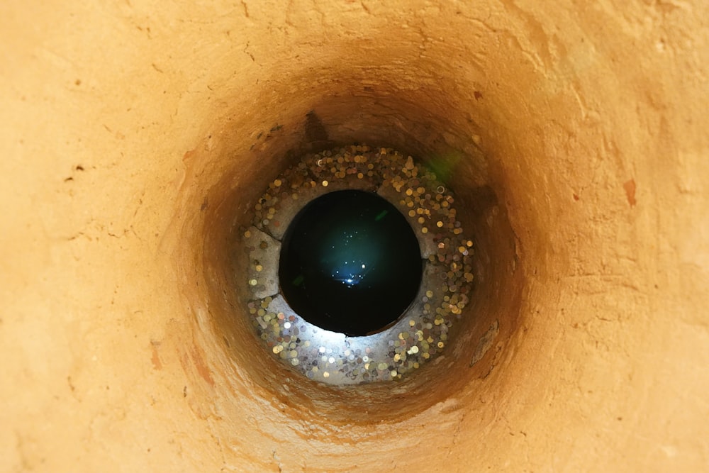 a close up of a hole in a wall