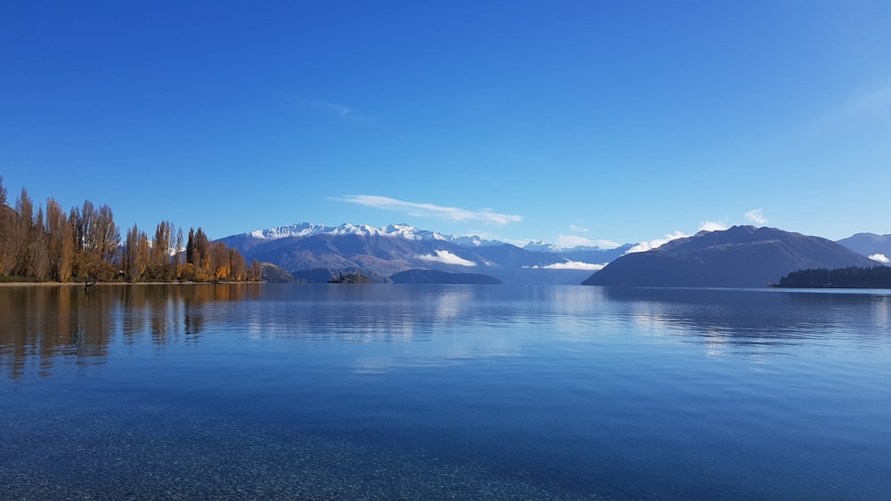 a large body of water surrounded by mountains