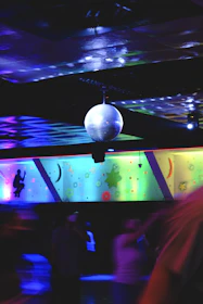 a disco ball sitting on top of a stage