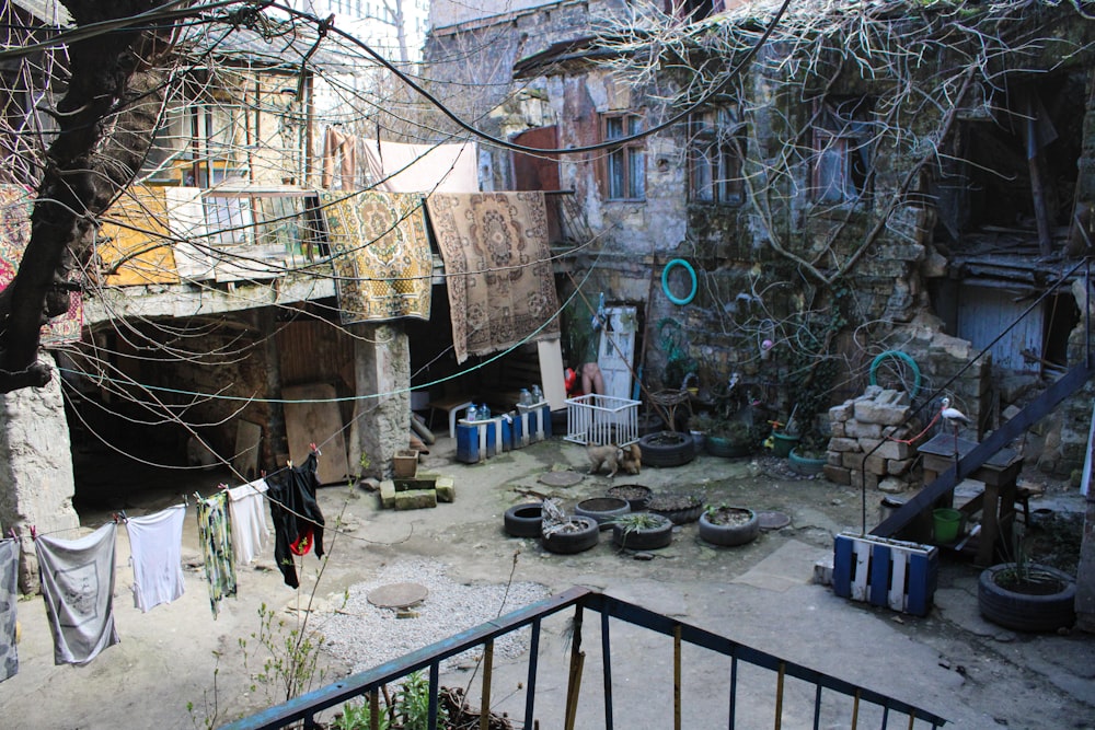a courtyard with clothes hanging out to dry