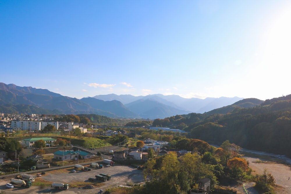 a view of a city with mountains in the background