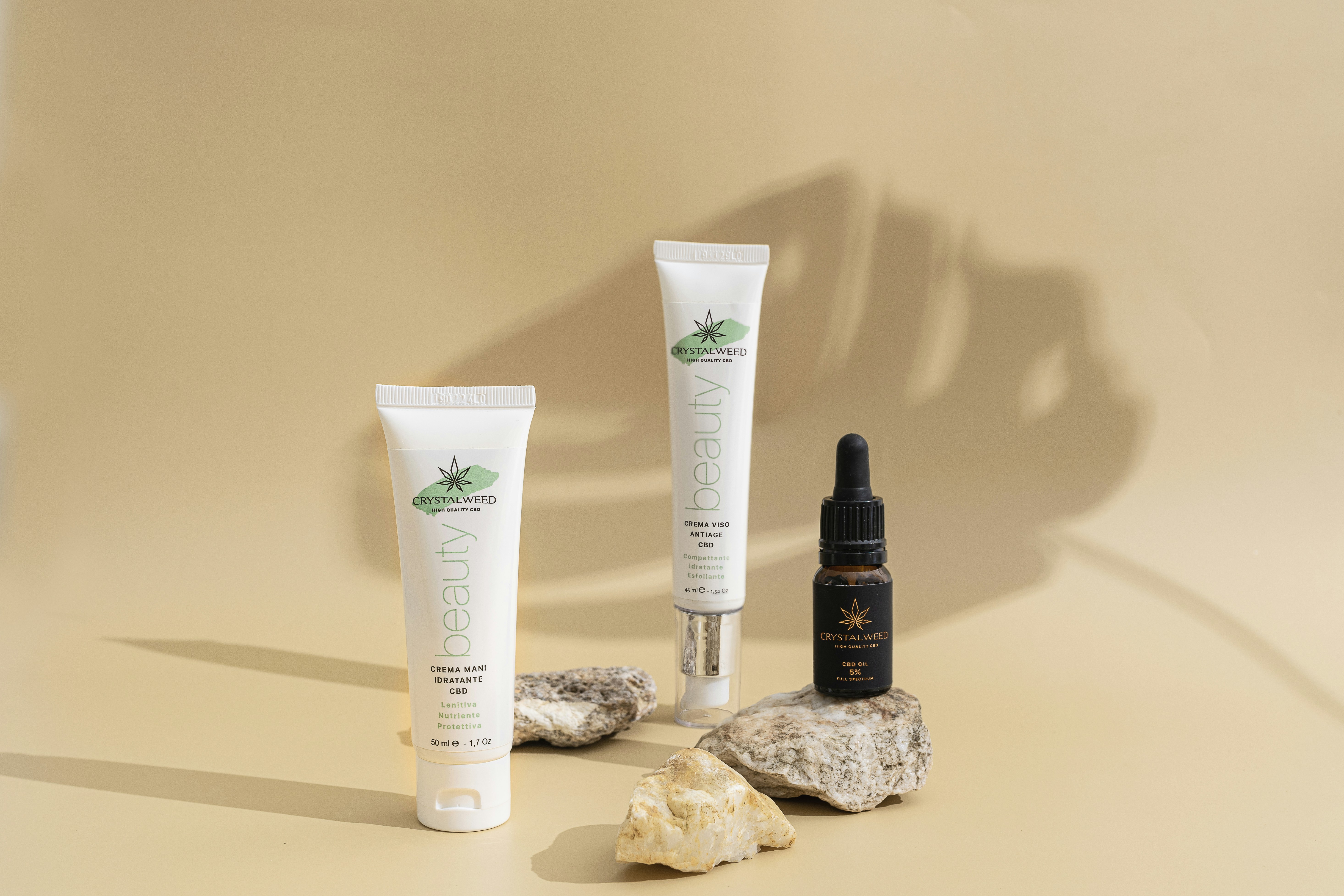 Skincare bottles and rocks