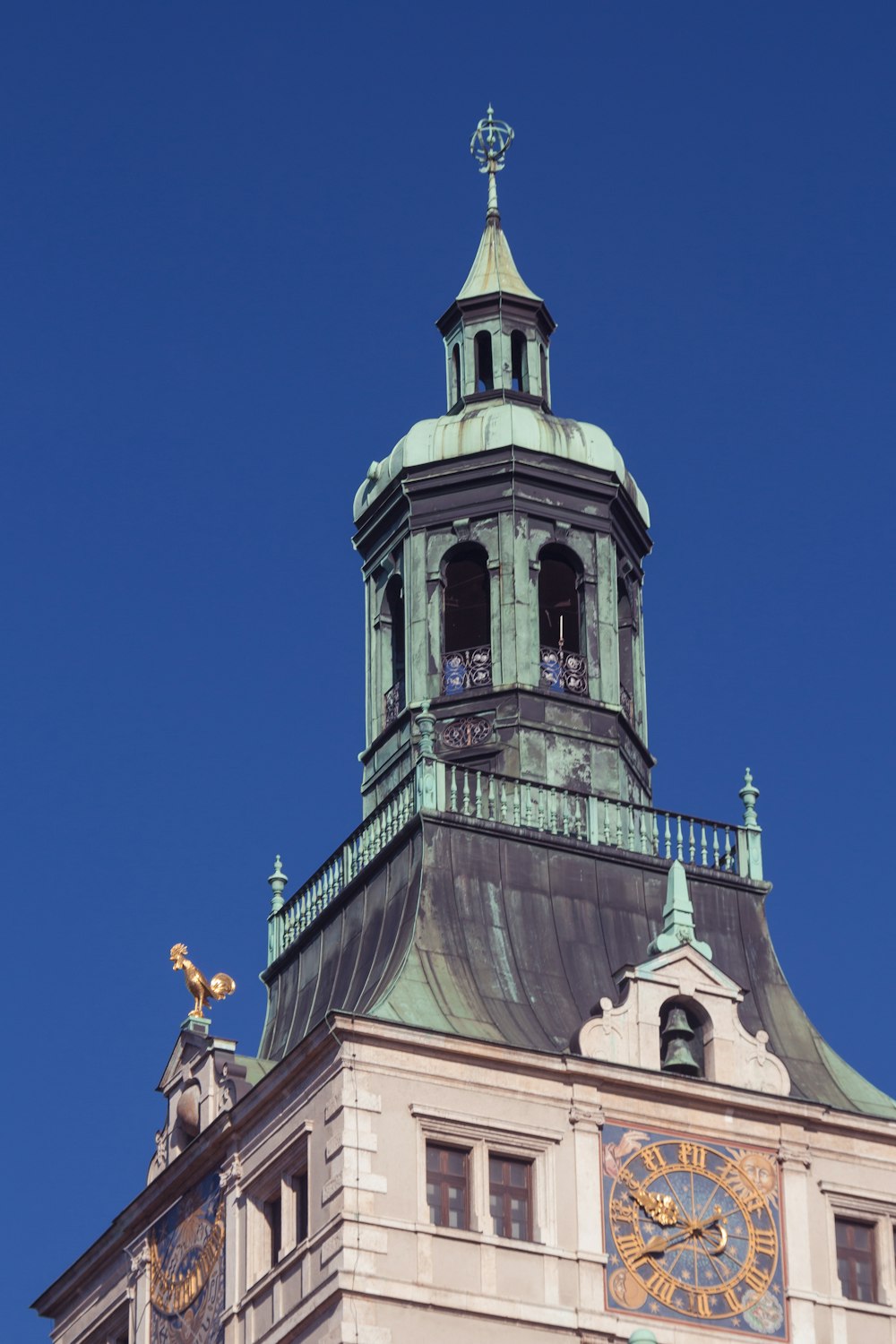 a large building with a clock on the top of it