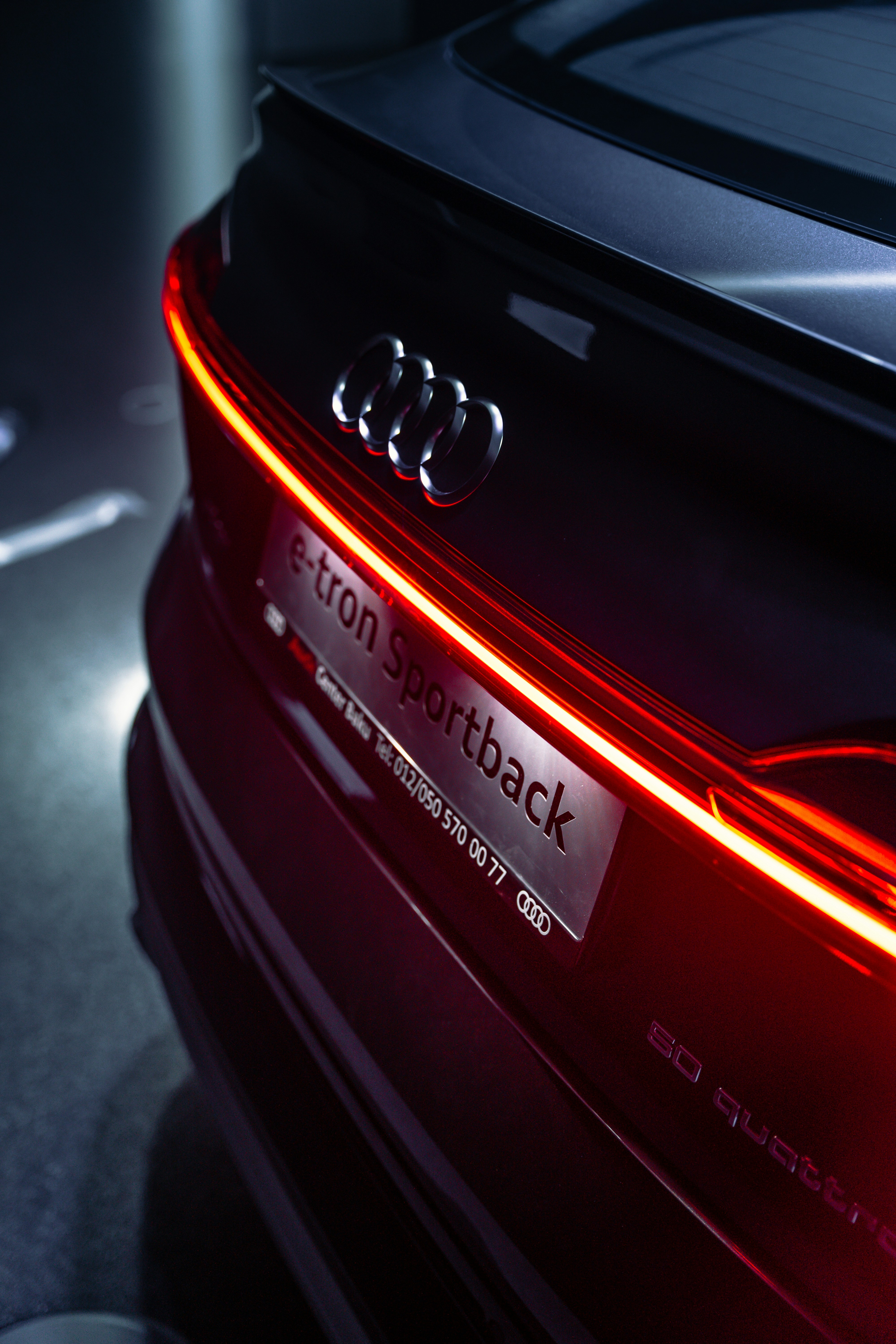 a close up of the tail lights of a car