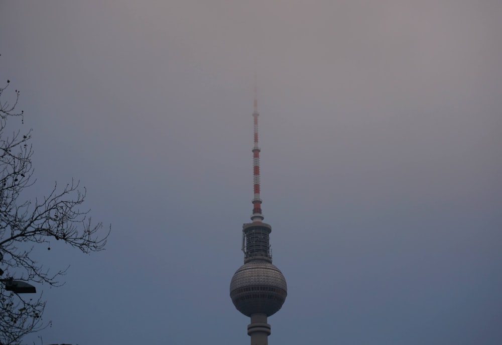 a very tall tower with a sky background