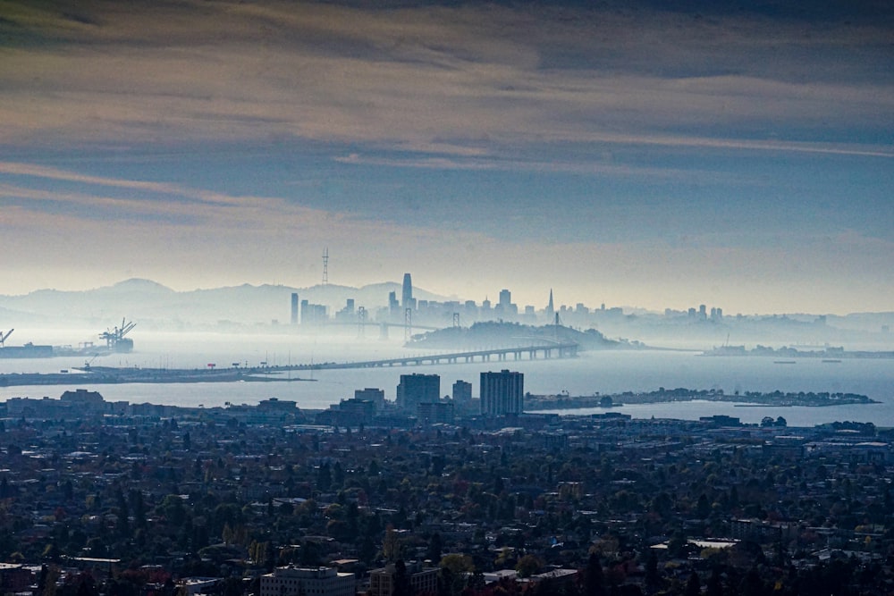 a view of a city with a bridge in the distance