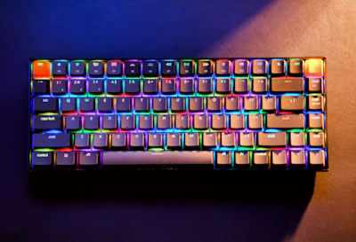 A sleek gaming keyboard glowing with customizable RGB lights.