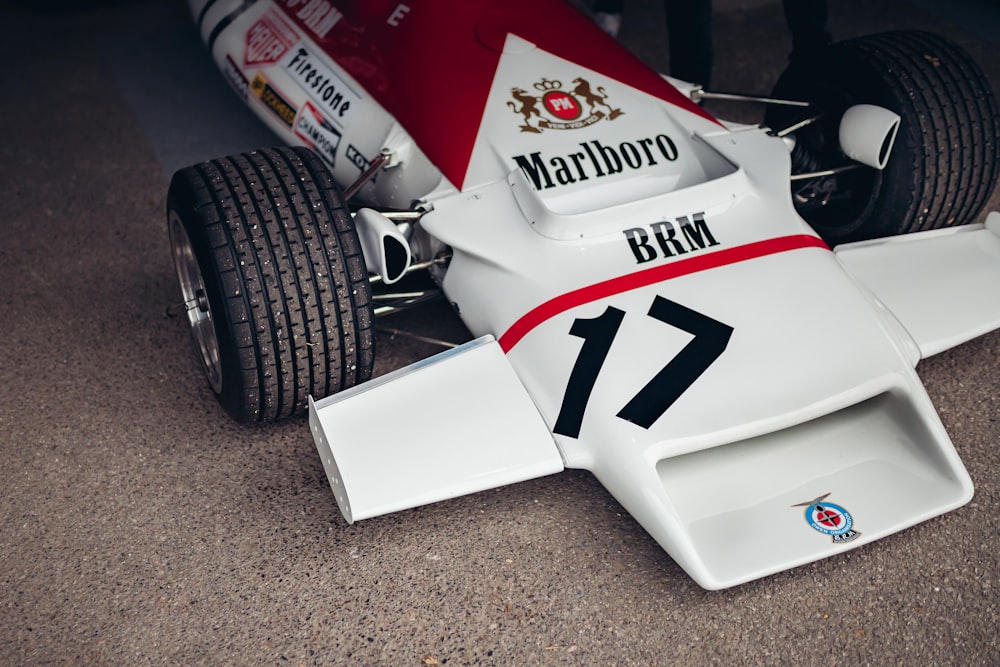a close up of a racing car on the ground