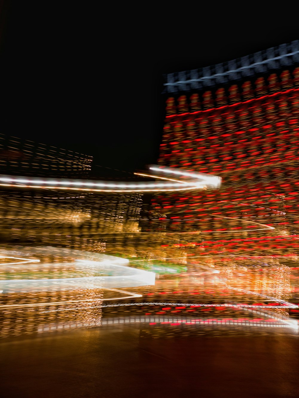 a blurry photo of a building at night