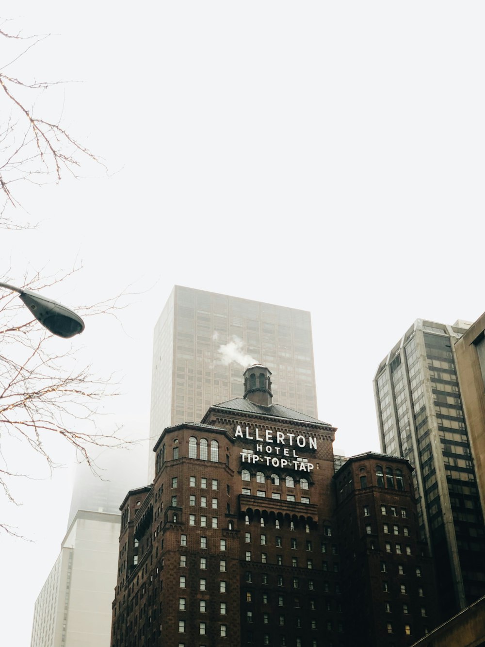 a tall building with a clock on the top of it