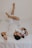 a man laying on top of a bed holding a baby