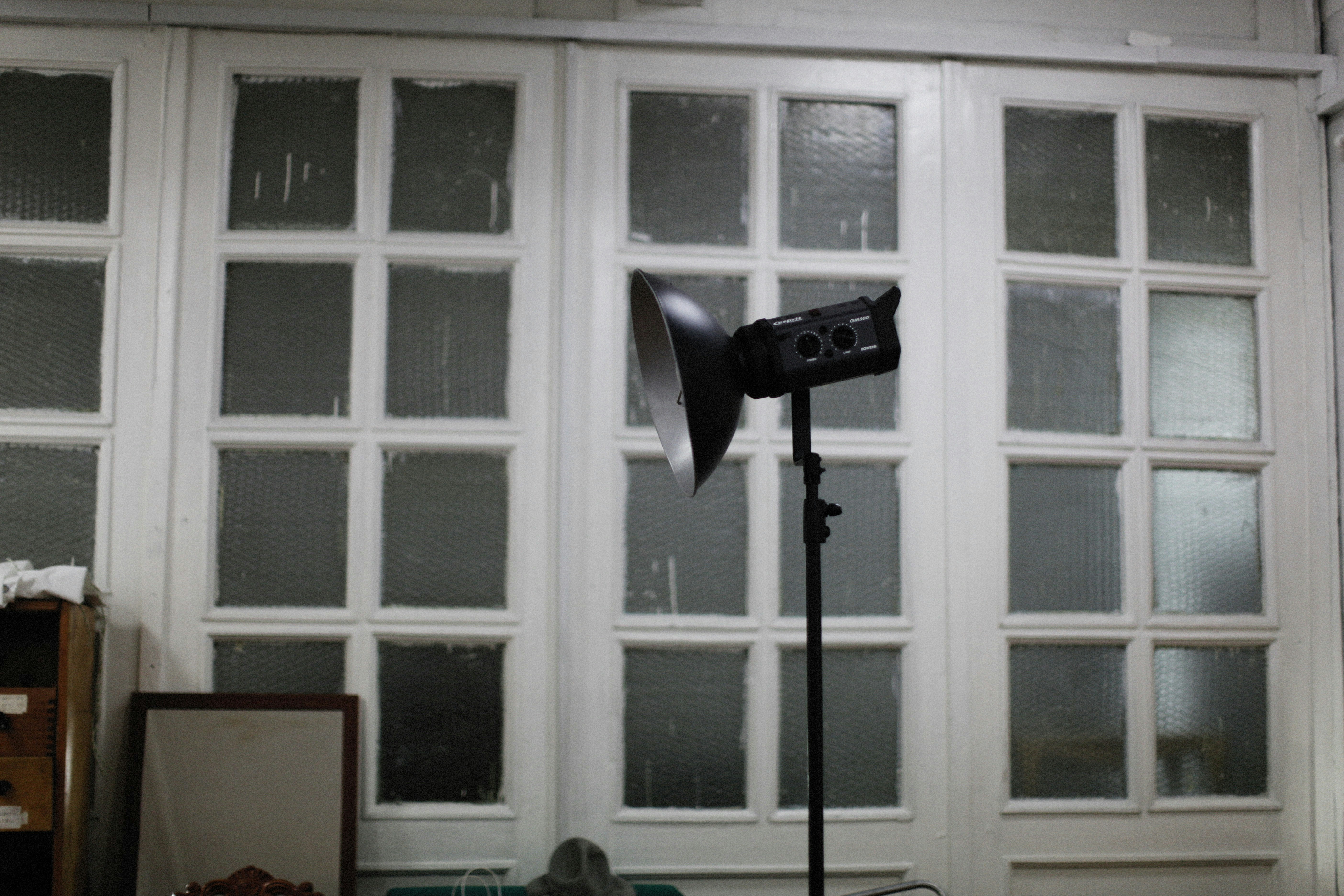 Professional window film installer at work
