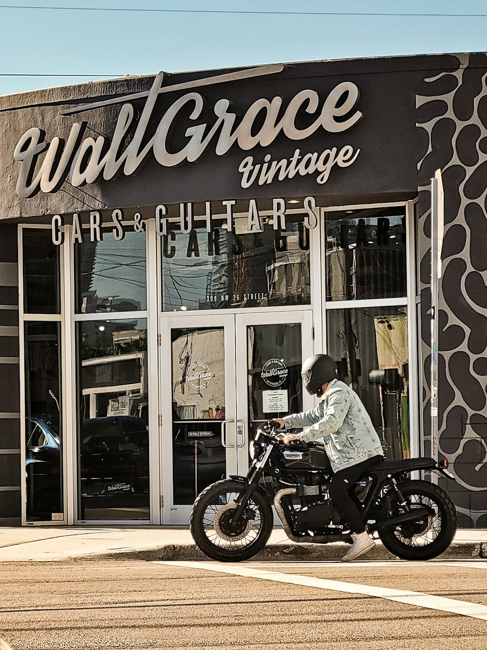 a man riding on the back of a motorcycle