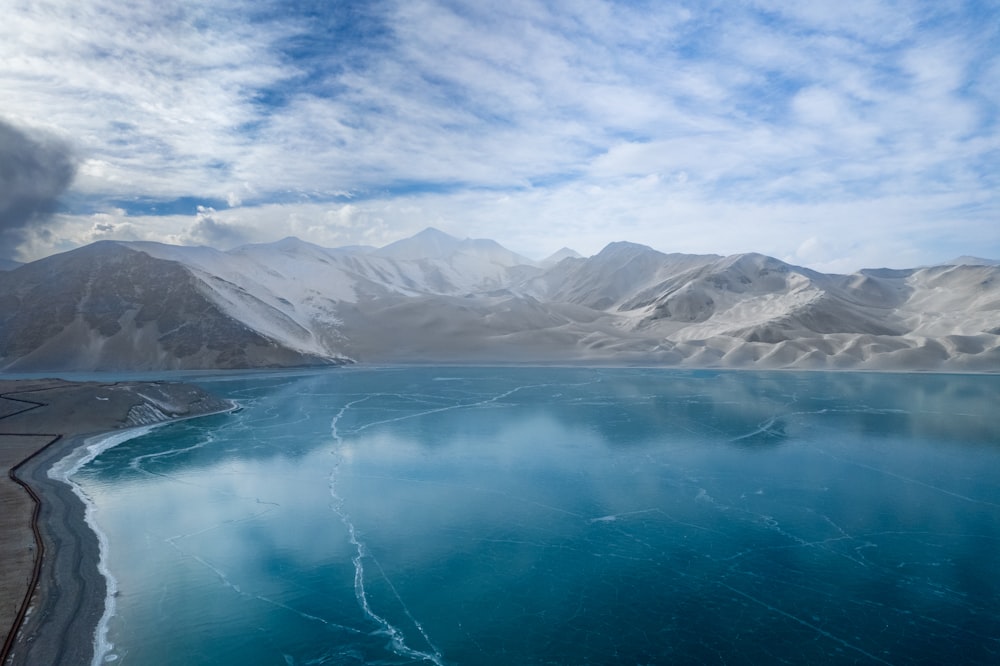 a large body of water surrounded by mountains