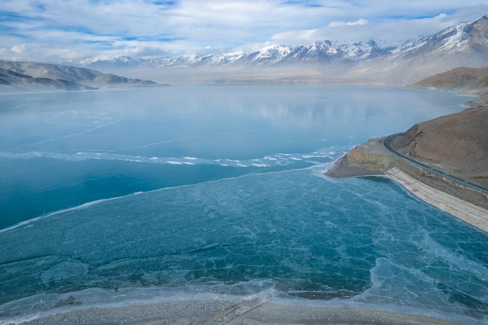 a large body of water surrounded by mountains