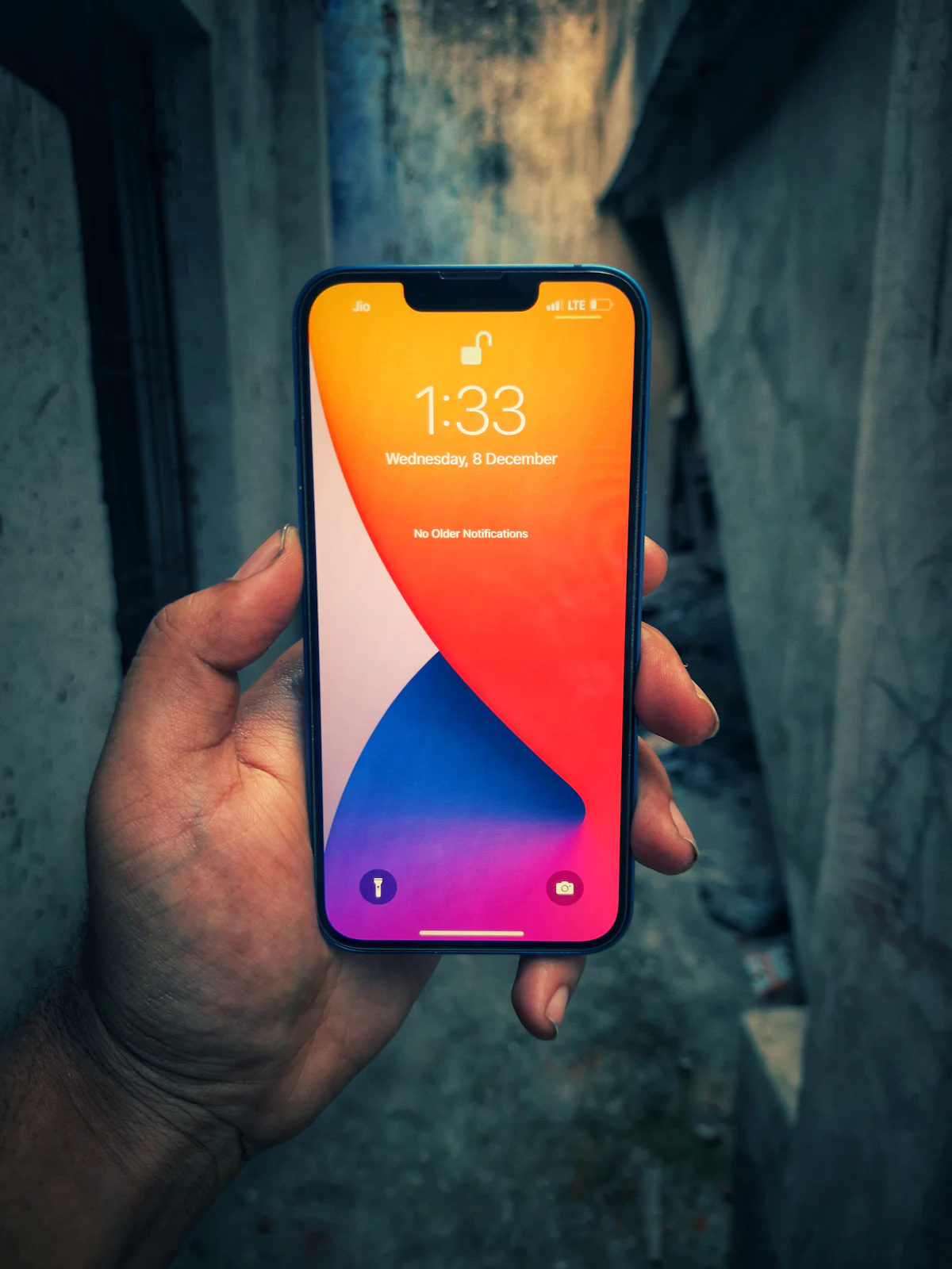 Person holding a smartphone to verify identity