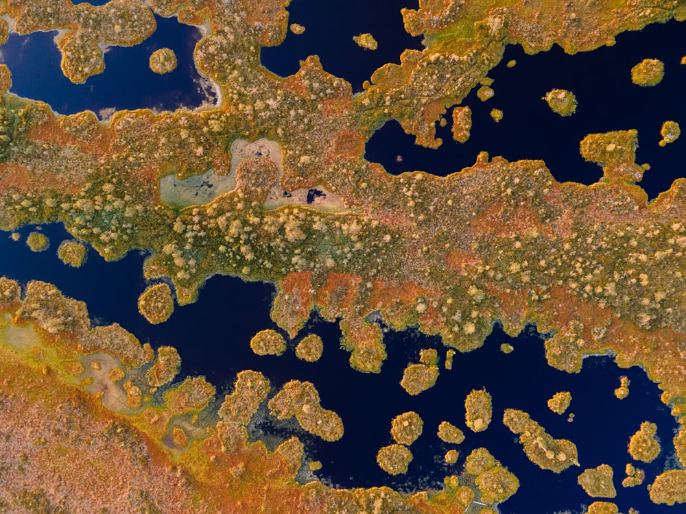 an aerial view of a body of water surrounded by land