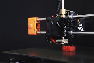 a close up of a machine with a black background