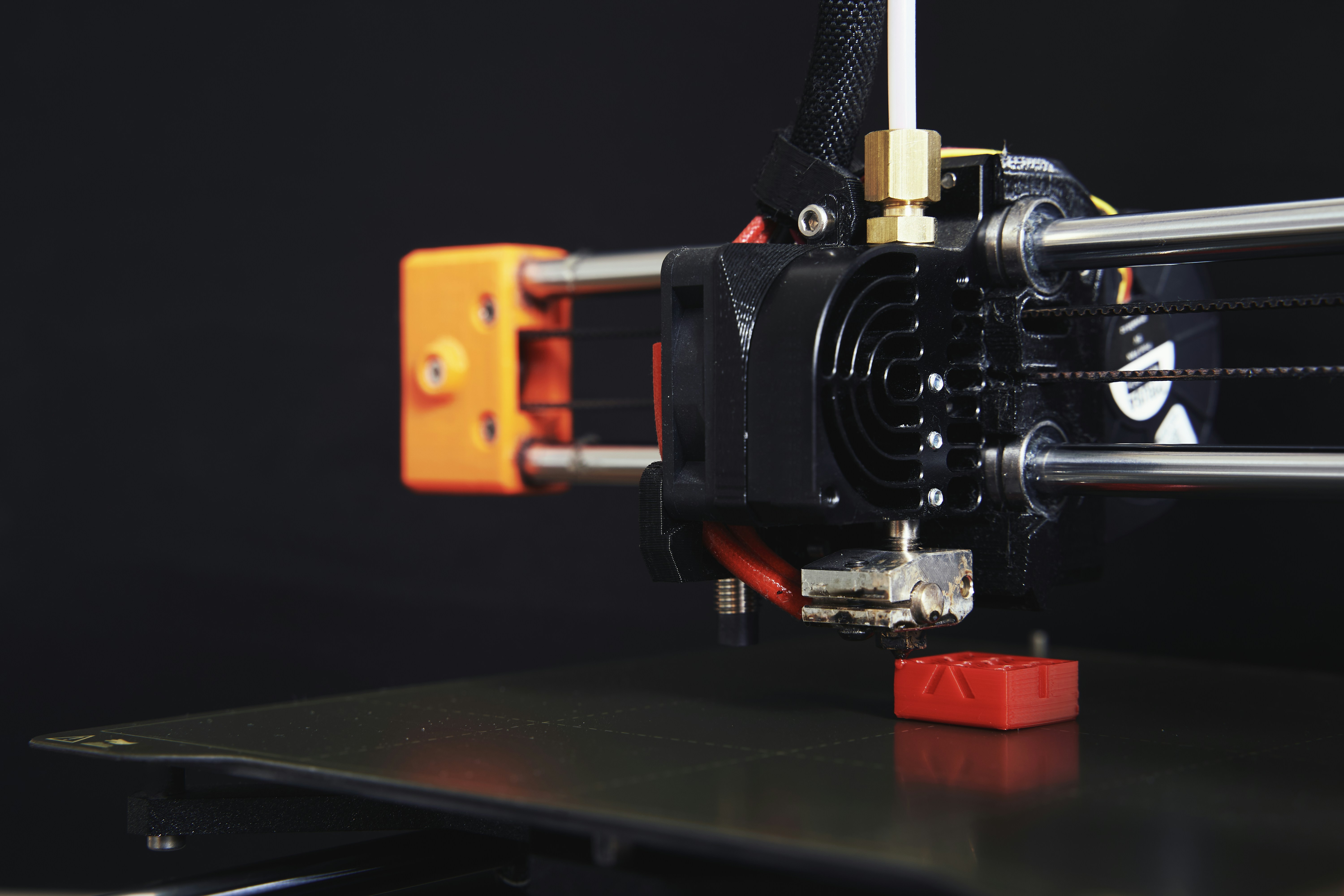 a close up of a machine with a black background