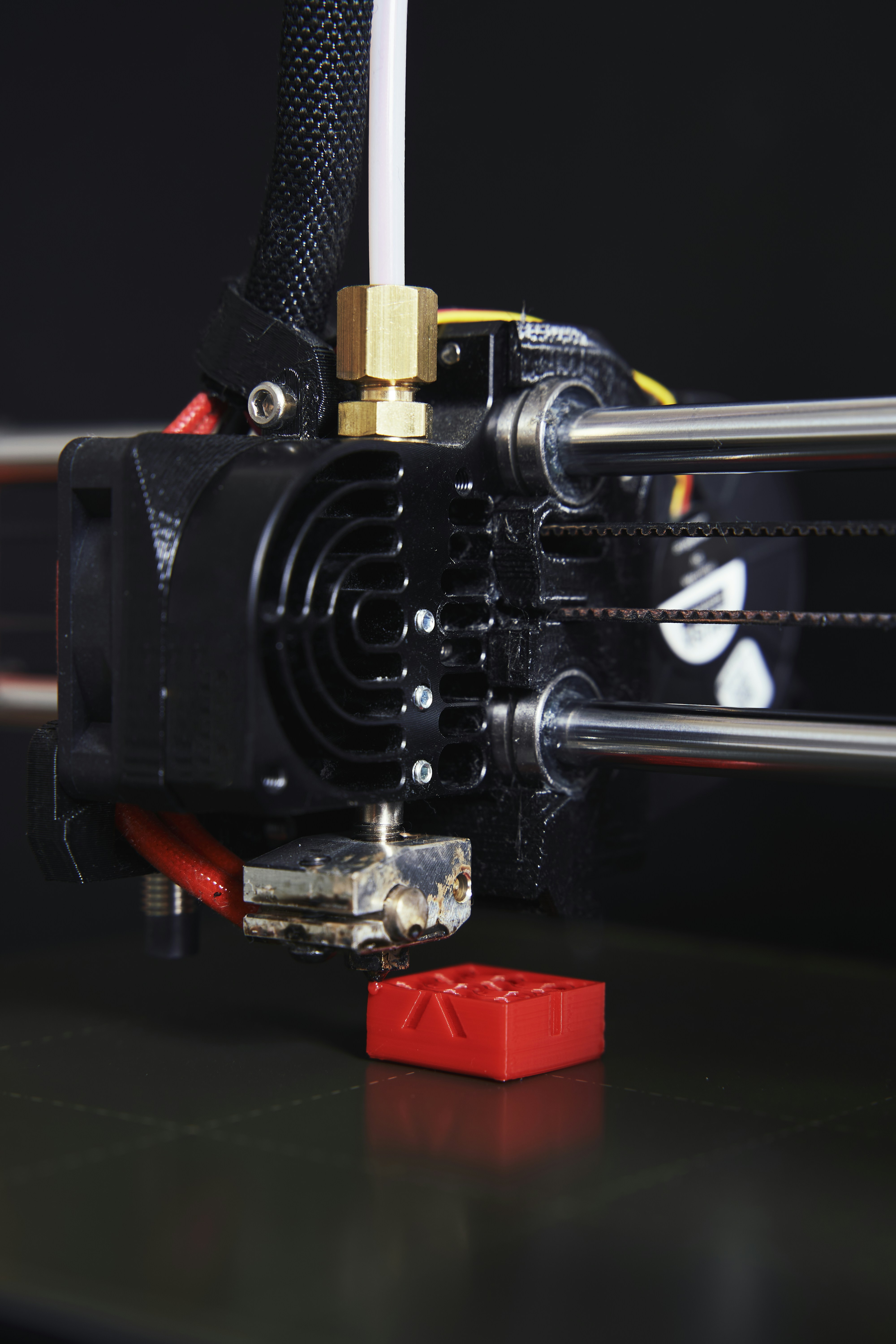a close up of a machine with wires attached to it