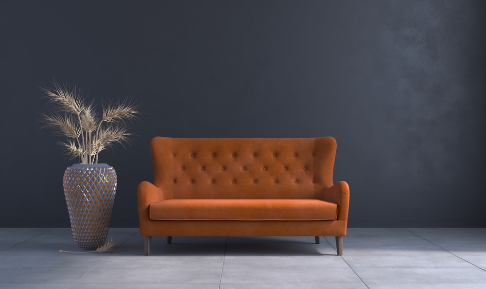 a living room with a couch and a vase