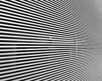 a black and white photo of a distorted wall