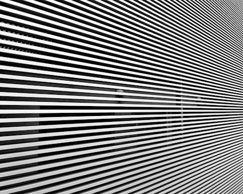 a black and white photo of a distorted wall