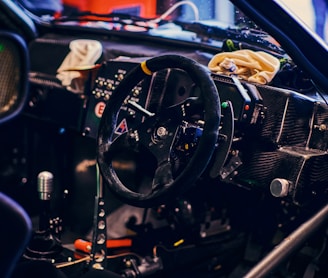 a steering wheel and dashboard of a car