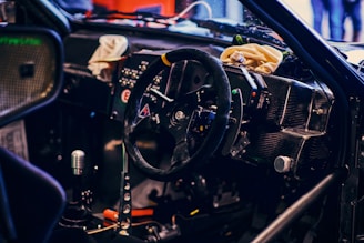 a steering wheel and dashboard of a car