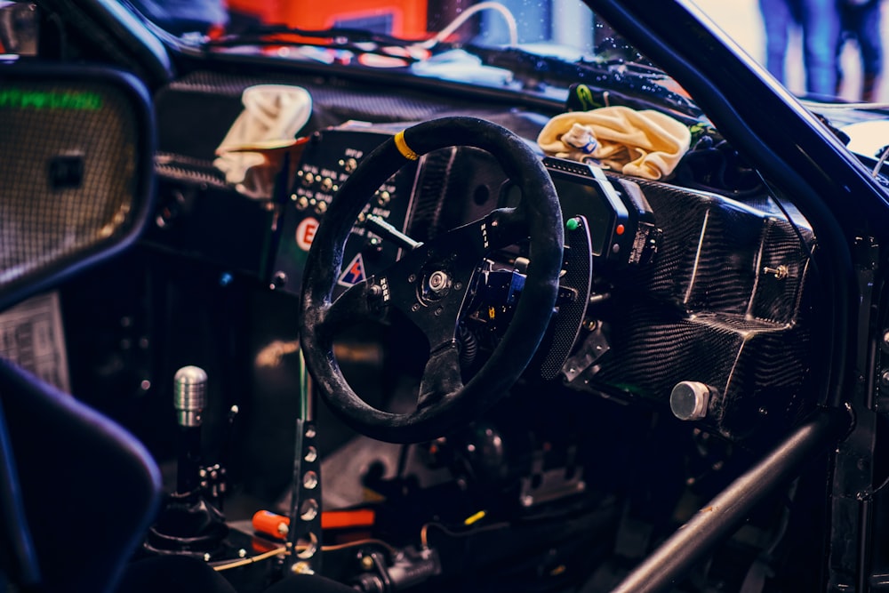 a steering wheel and dashboard of a car