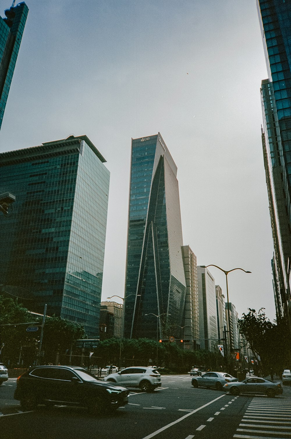 a city street filled with lots of tall buildings