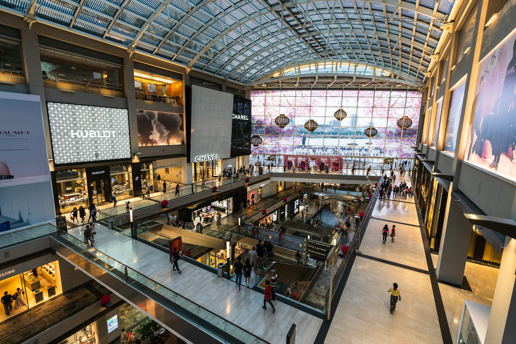 a mall filled with lots of people walking around