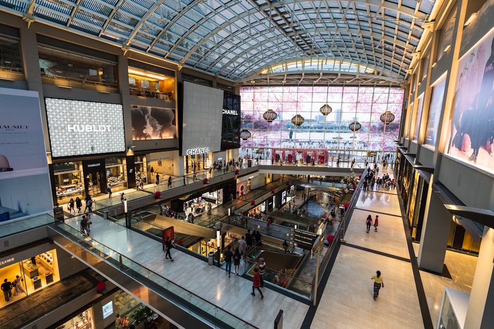 a mall filled with lots of people walking around