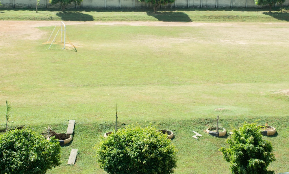 a soccer field with a soccer goal in the middle of it