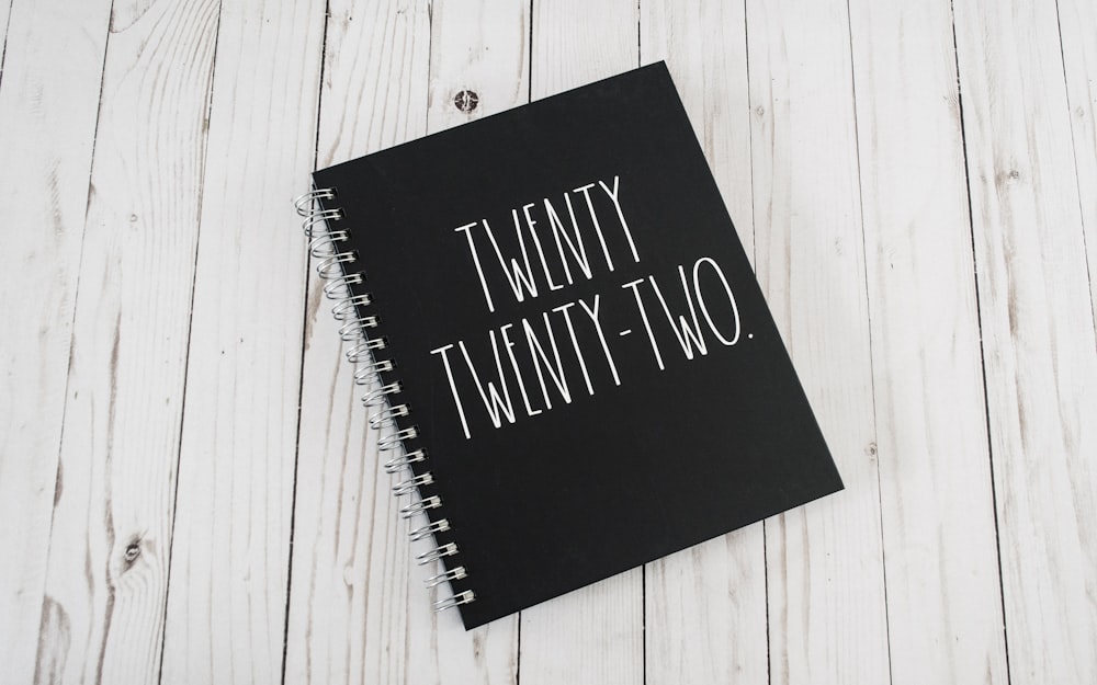 a notebook with the words twenty twenty two written on it