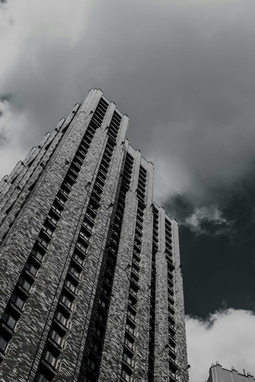 a black and white photo of a tall building