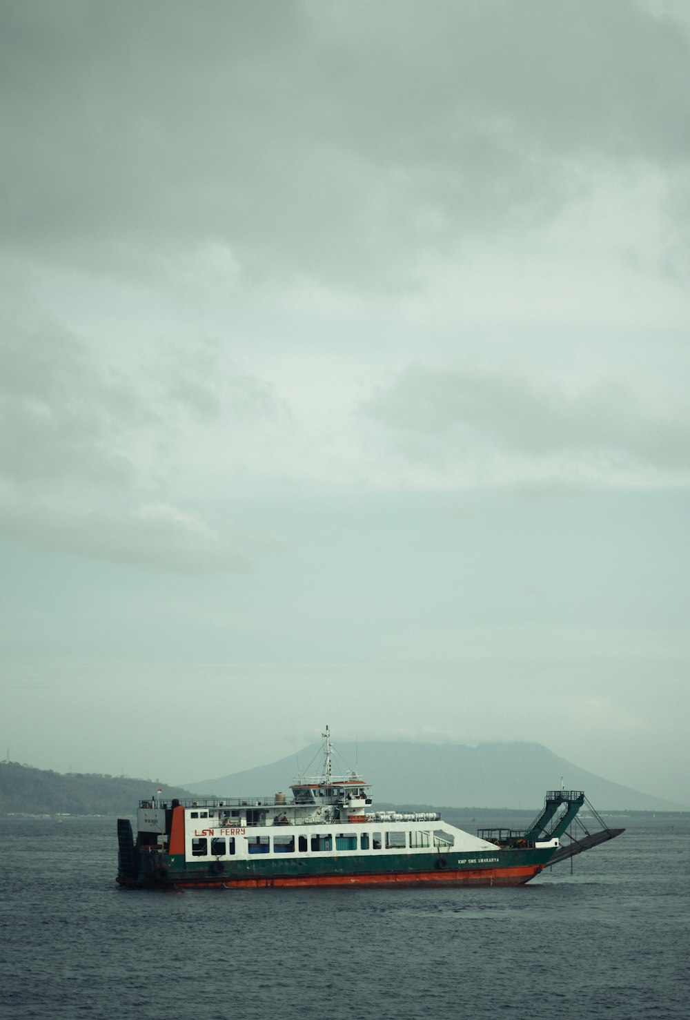 a large boat floating on top of a large body of water