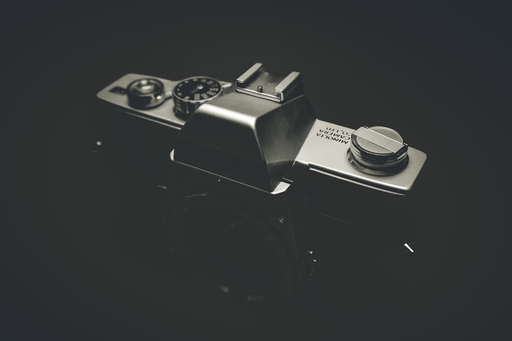 a black and white photo of a camera