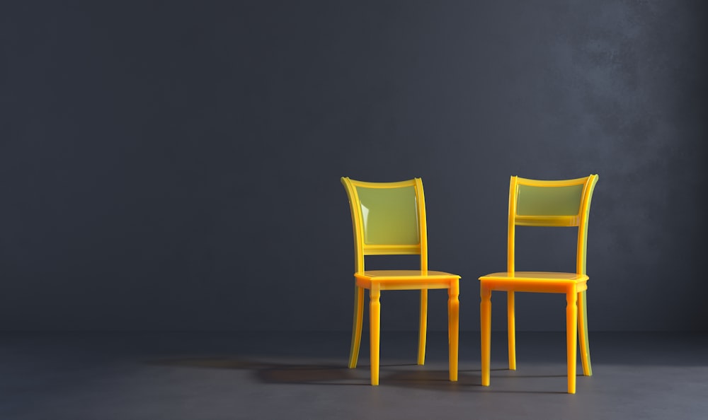 a couple of yellow chairs sitting next to each other