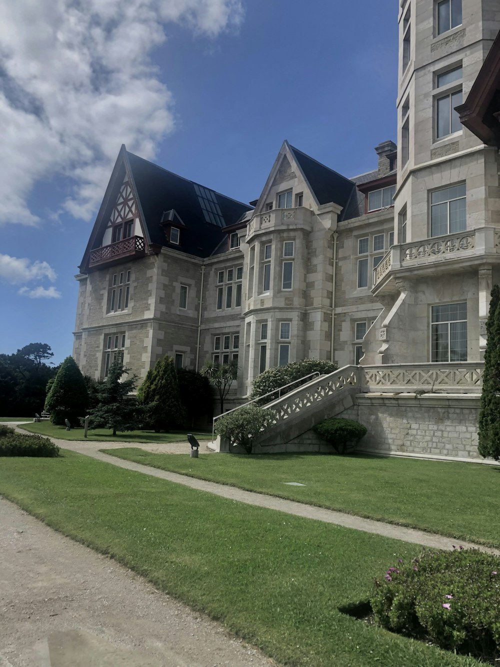 a large building with a lot of windows and stairs