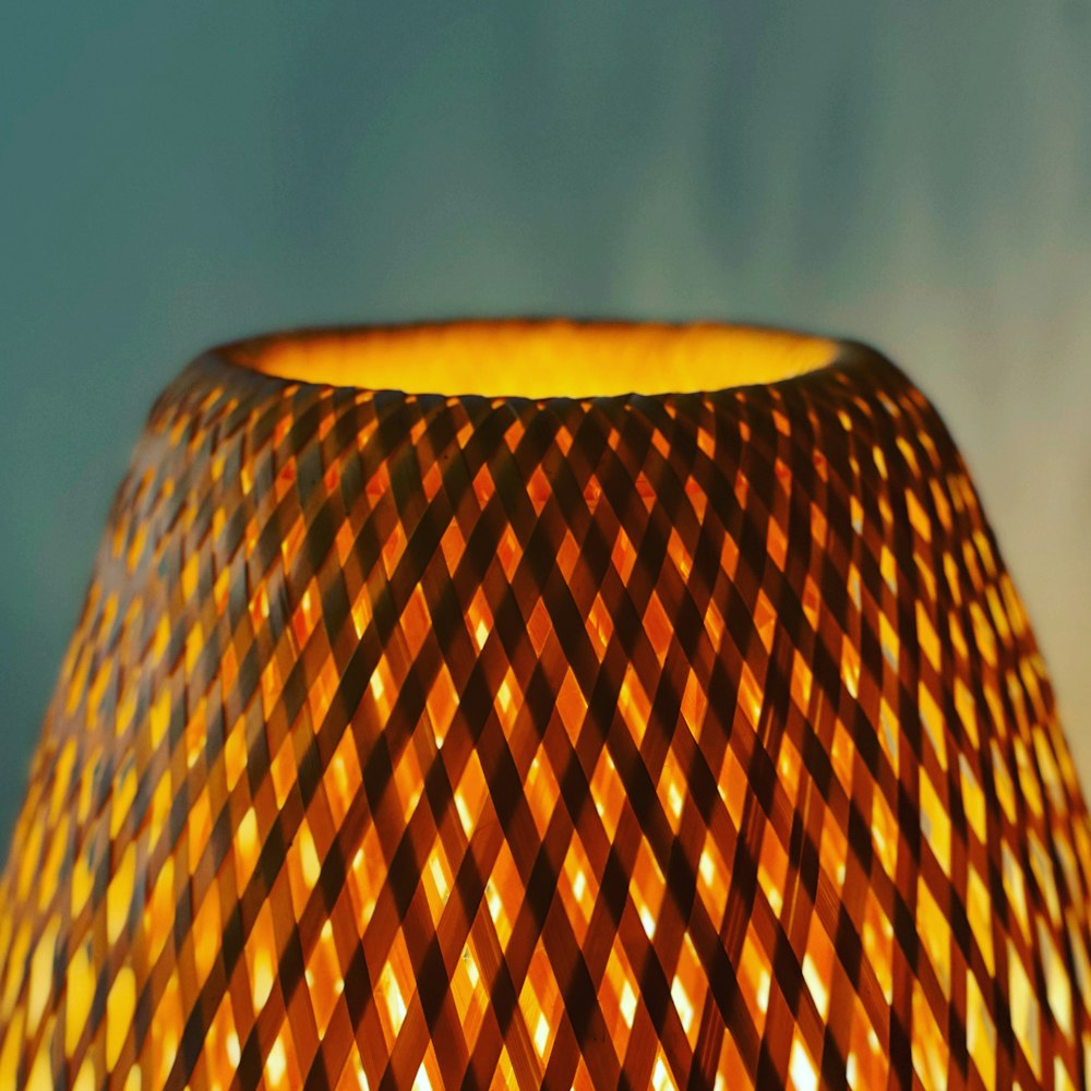 a close up of a lamp on a table