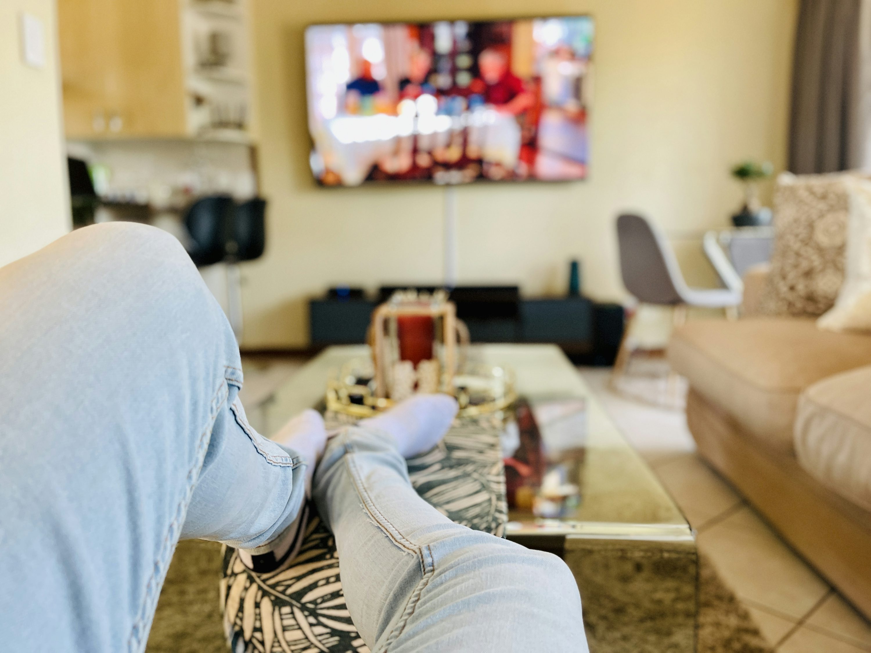 Person watching TV in living room
