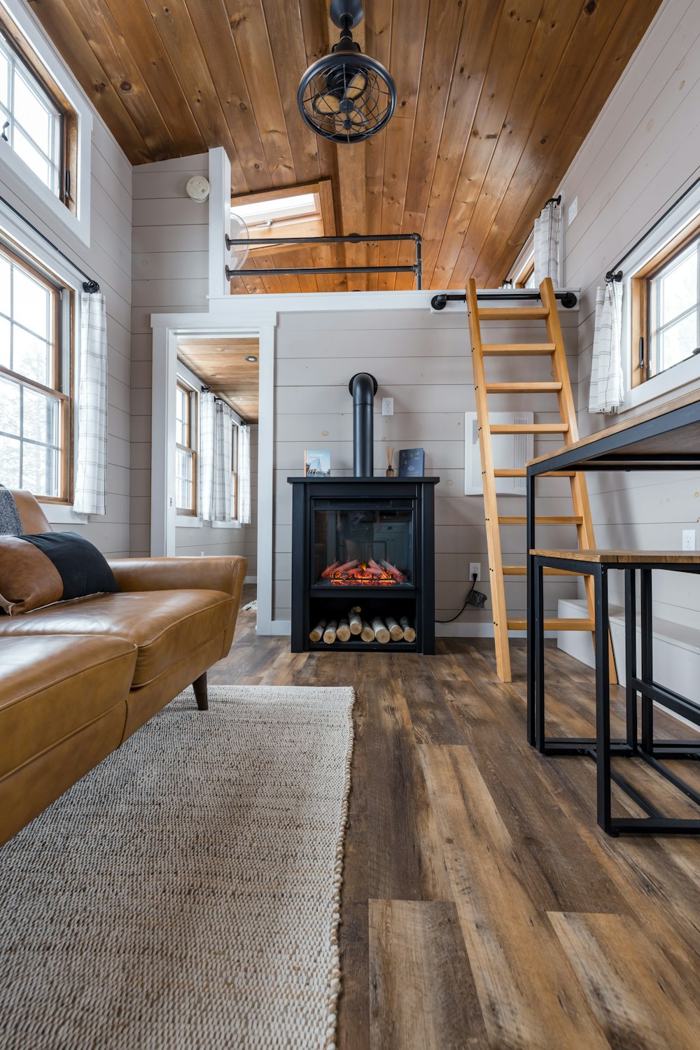 a living room with a couch and a fire place