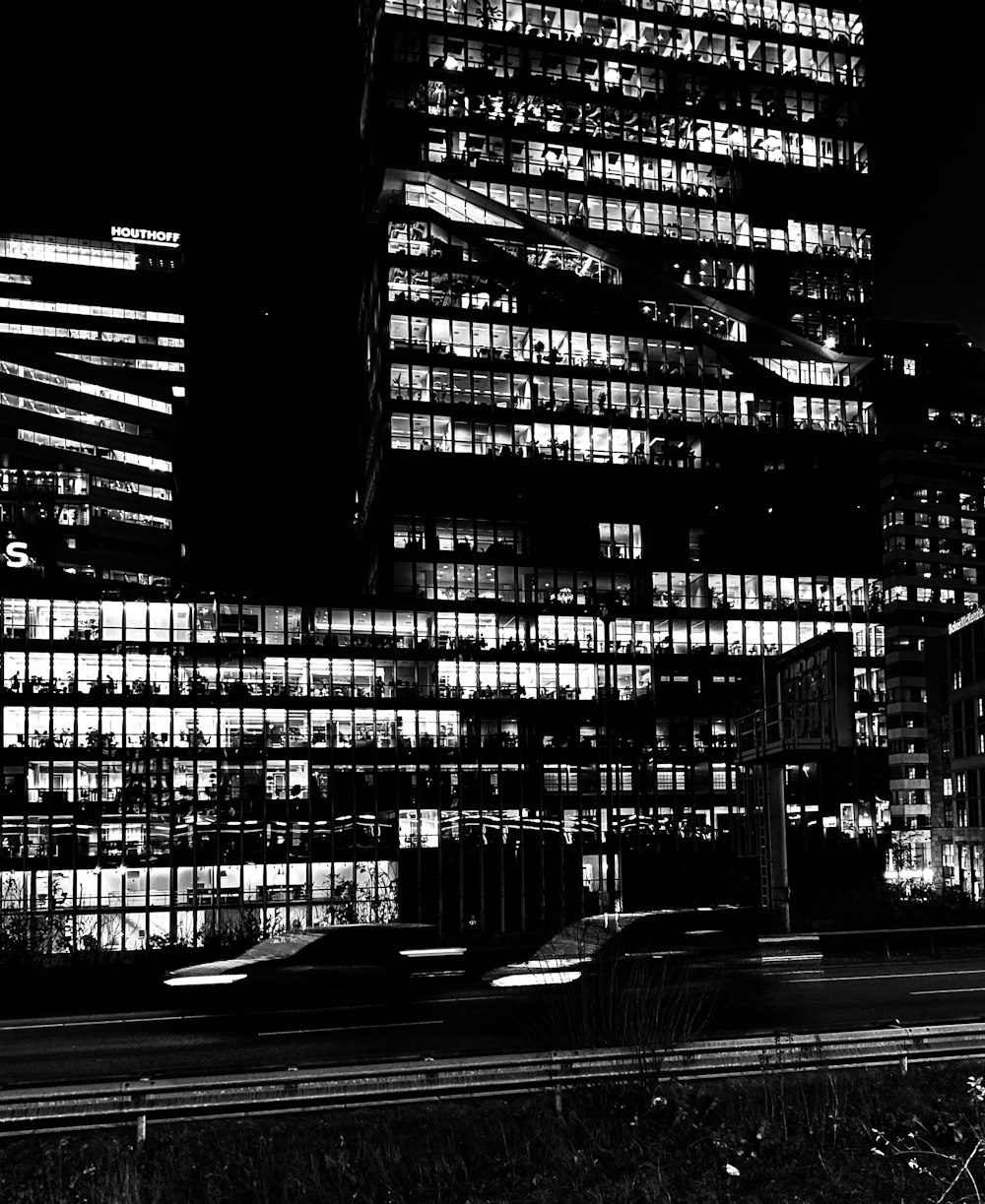 a black and white photo of a city at night