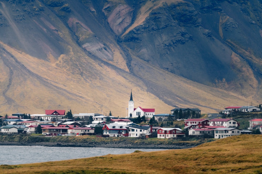 a town with a mountain in the background