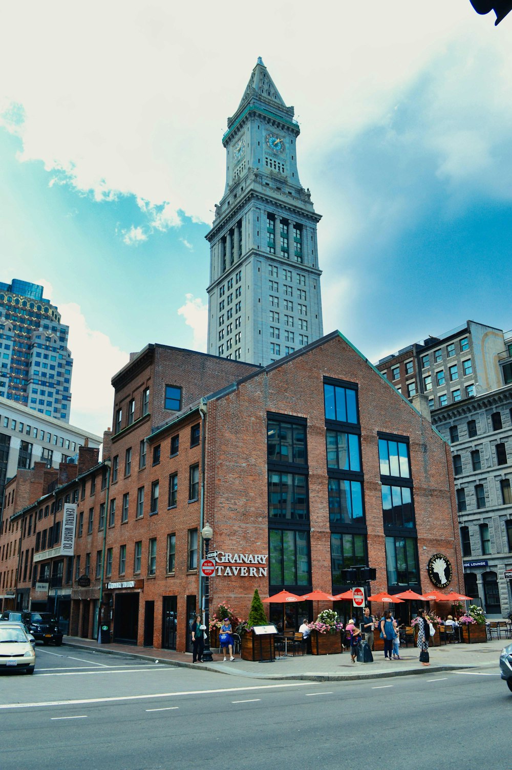 a tall brick building with a clock tower