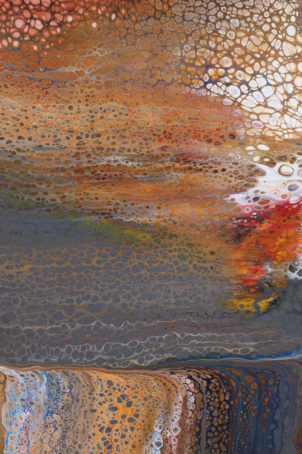 an abstract painting of water and rocks